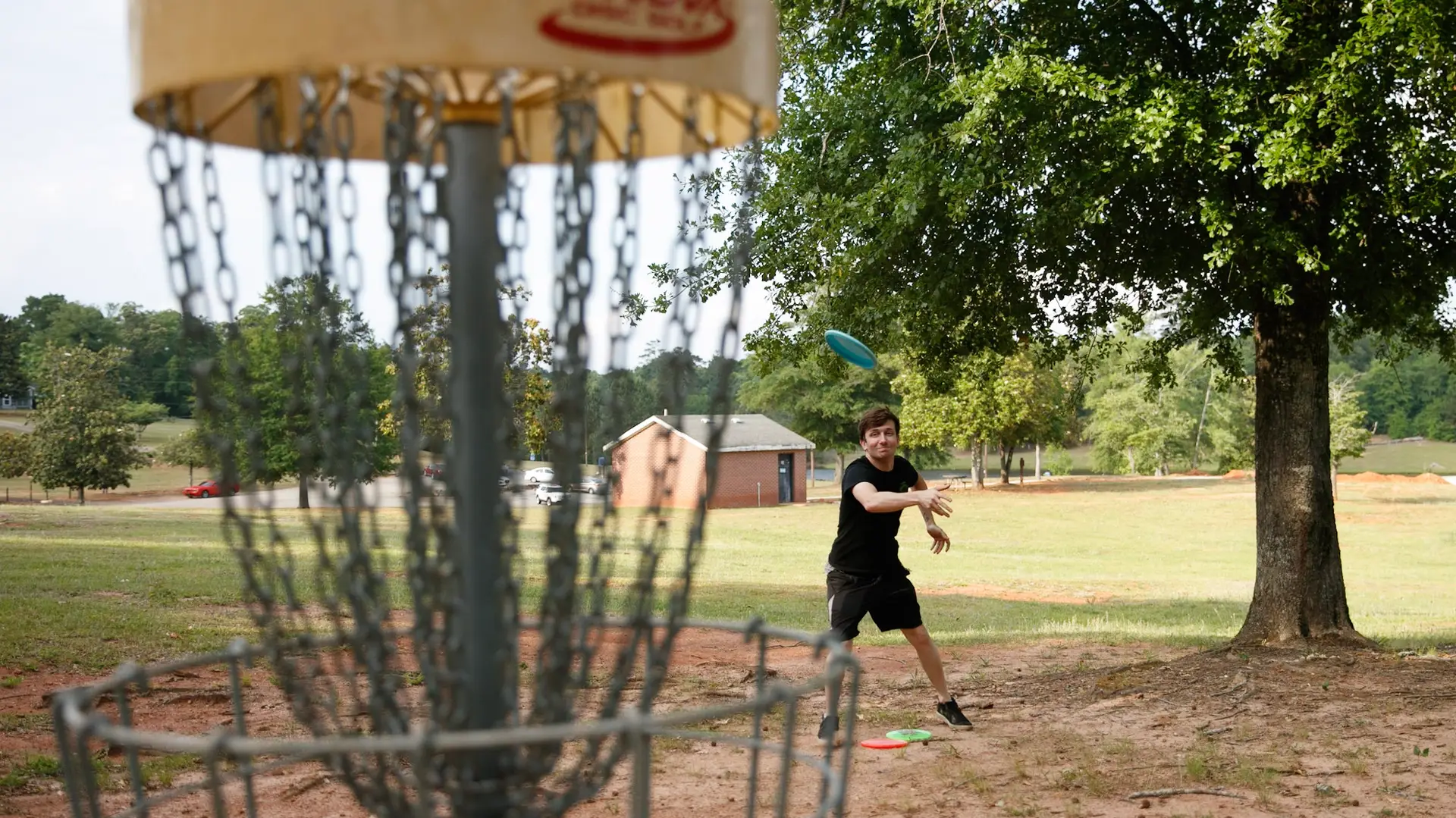 man playing disc golf