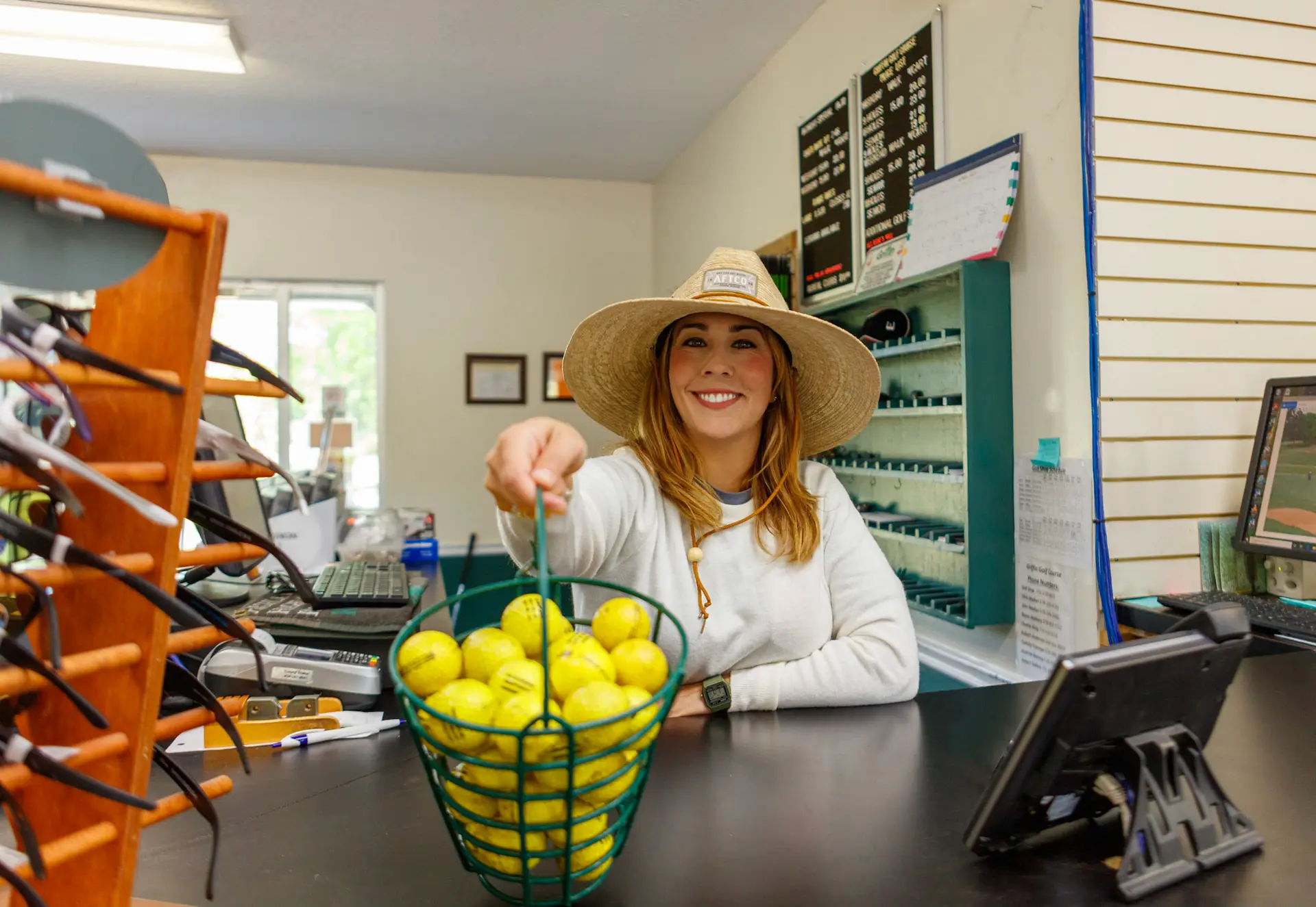 woman with golf balls