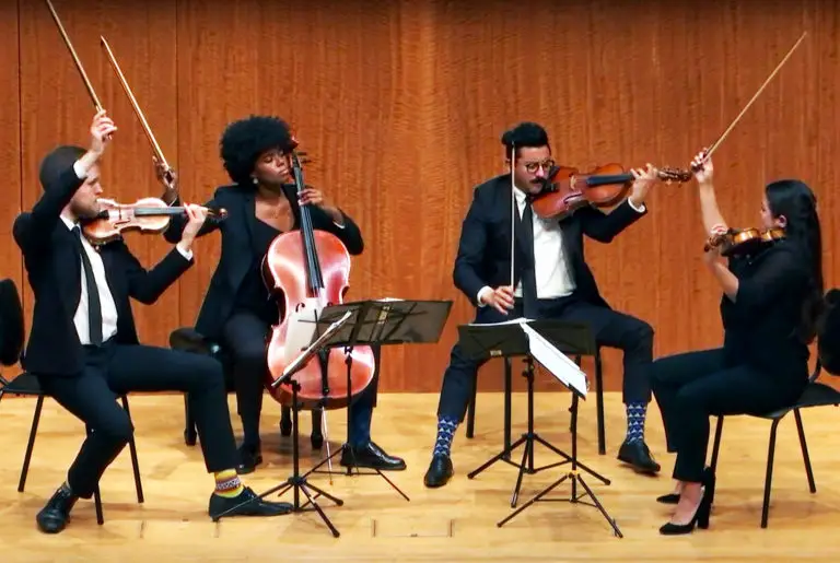 people playing string instruments